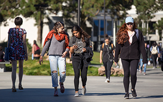 Students walking across campus